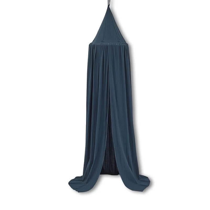 Simple forest green nursery bed canopy, made from solid color fabric.