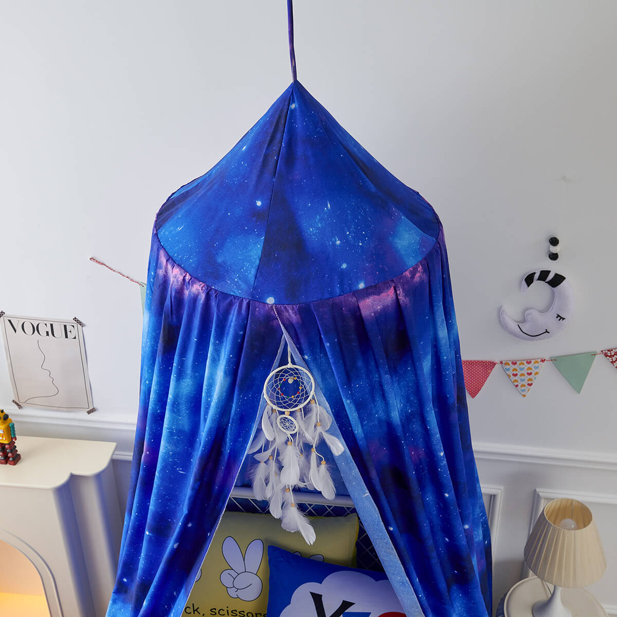 Close-up of the Blue Starry Sky Kids Bed Canopy, highlighting the galaxy print fabric and the included dreamcatcher.