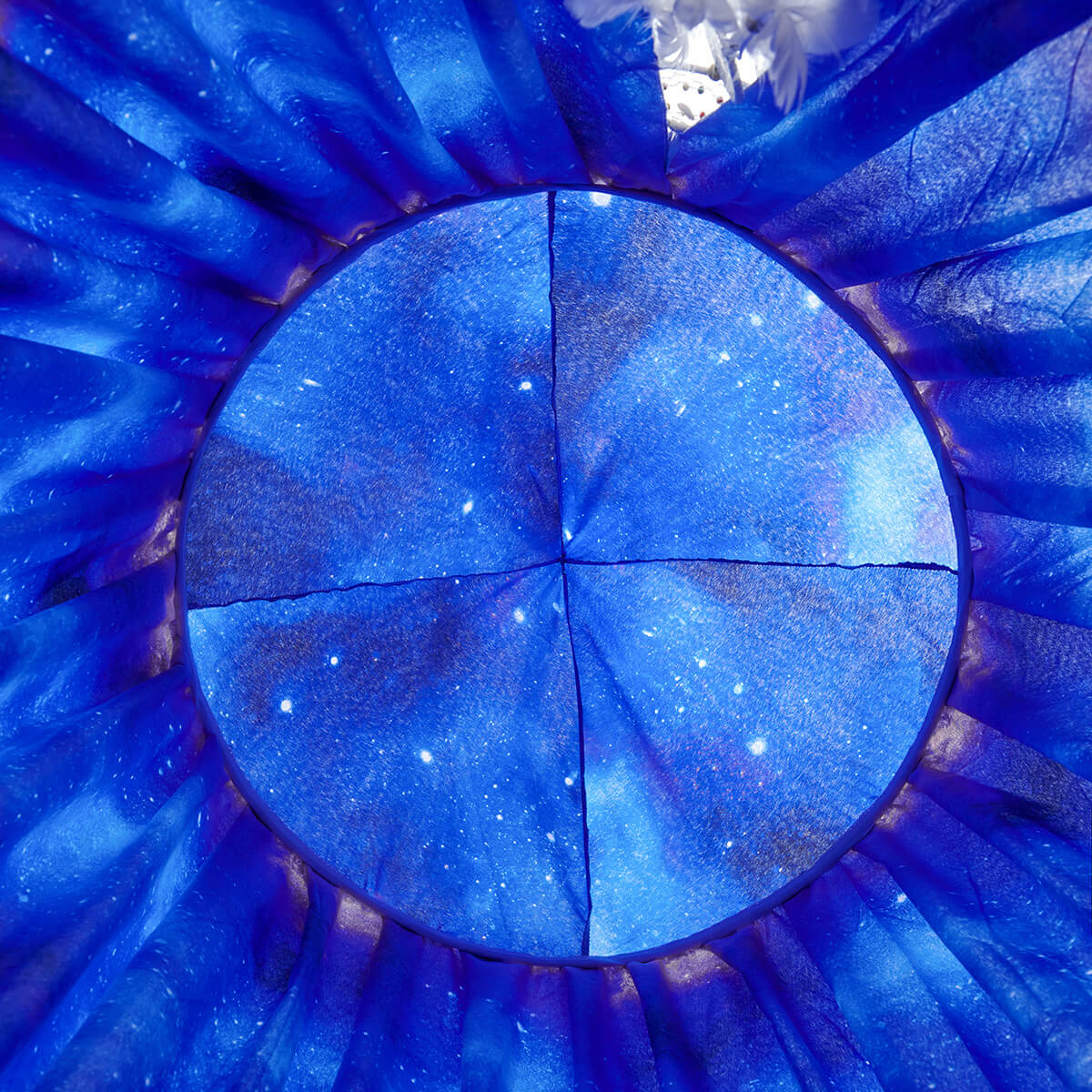 Top-down view of the Blue Starry Sky Kids Bed Canopy, showing the detailed galaxy print with bright stars.