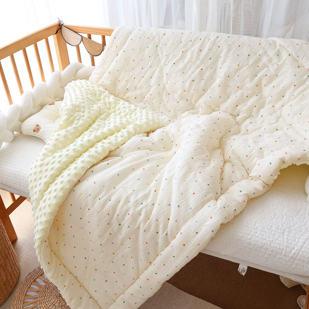 Warm baby quilt in floral and dot prints for cold seasons