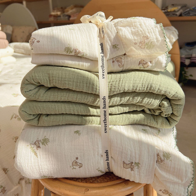 Ruffled bunny bedding set folded with ribbon wrap