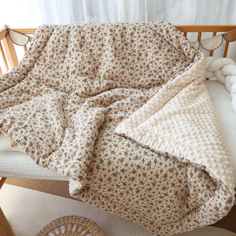 Cozy winter baby quilt with cotton gauze and minky fleece