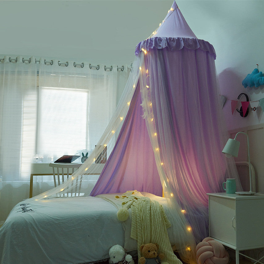 Purple double-layer kids bed canopy with sheer mesh and string lights, providing a cozy and magical feel for a child's bedroom.