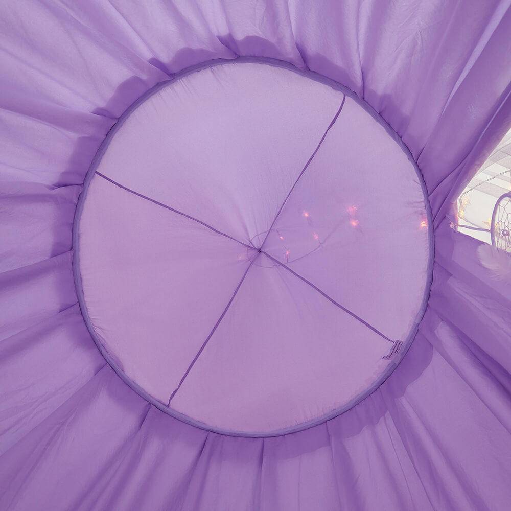 Looking up inside the purple double-layer kids bed canopy, showing the internal structure of the dome and string lights.