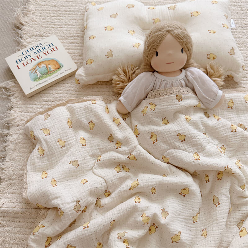 cotton muslin comforter with small yellow duck pattern