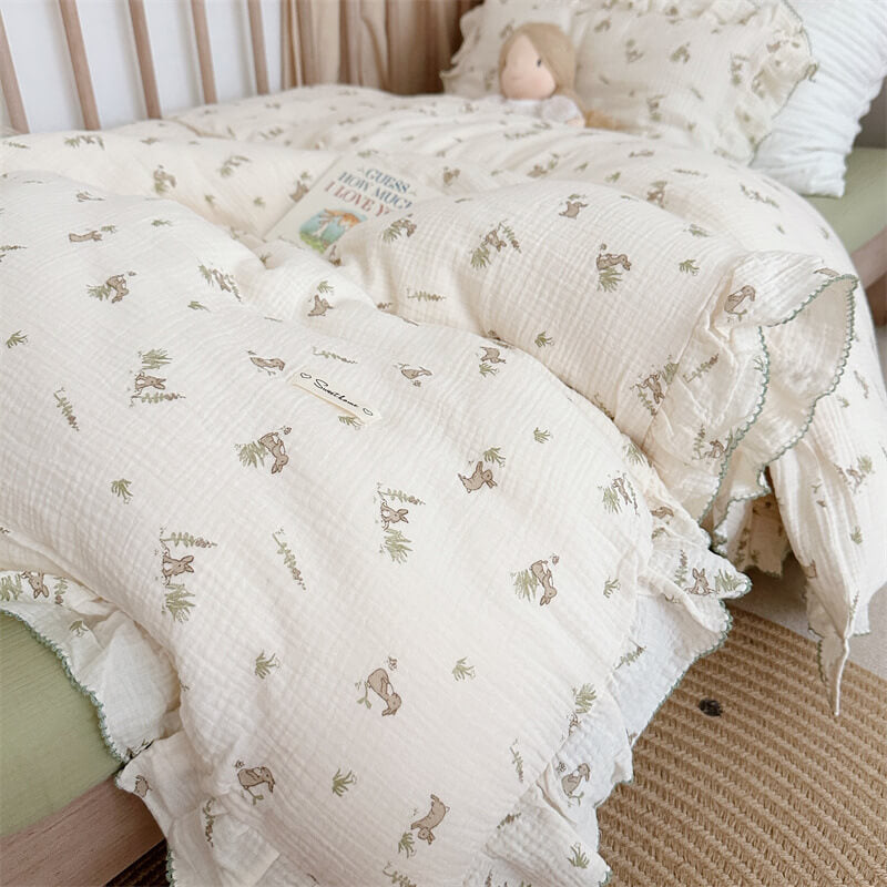 Close-up of ruffle edge bunny duvet coverand pillowcase in cotton muslin