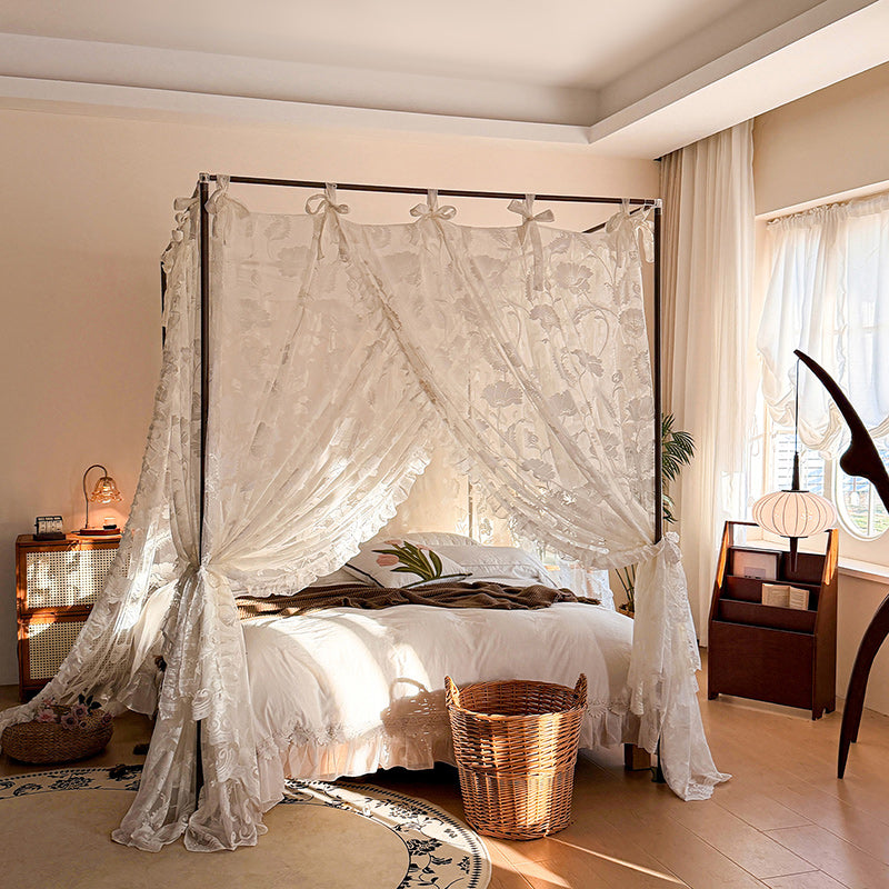 Bedroom with a canopy bed and decorative elements