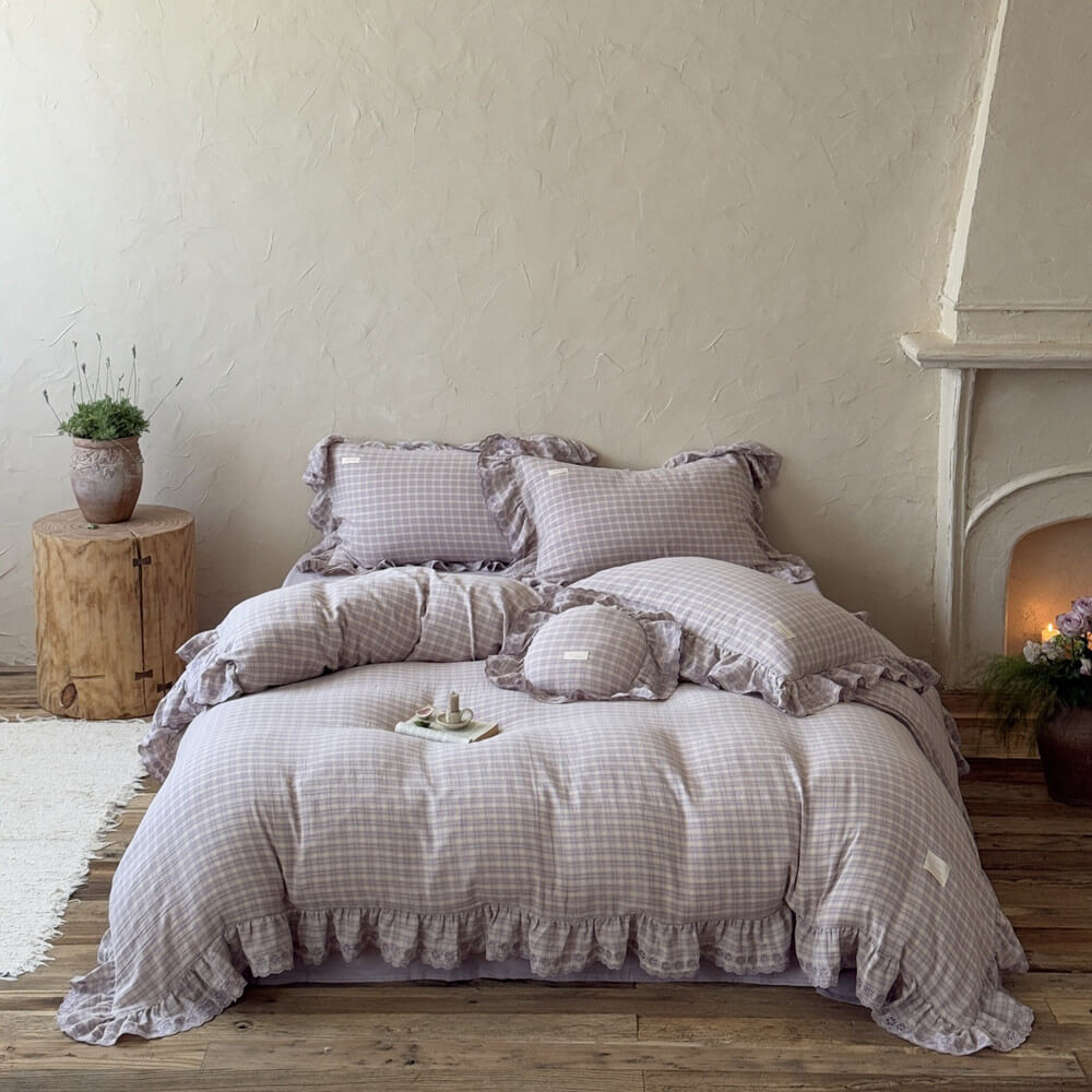 Full view of lavender plaid bedding set with ruffled trim