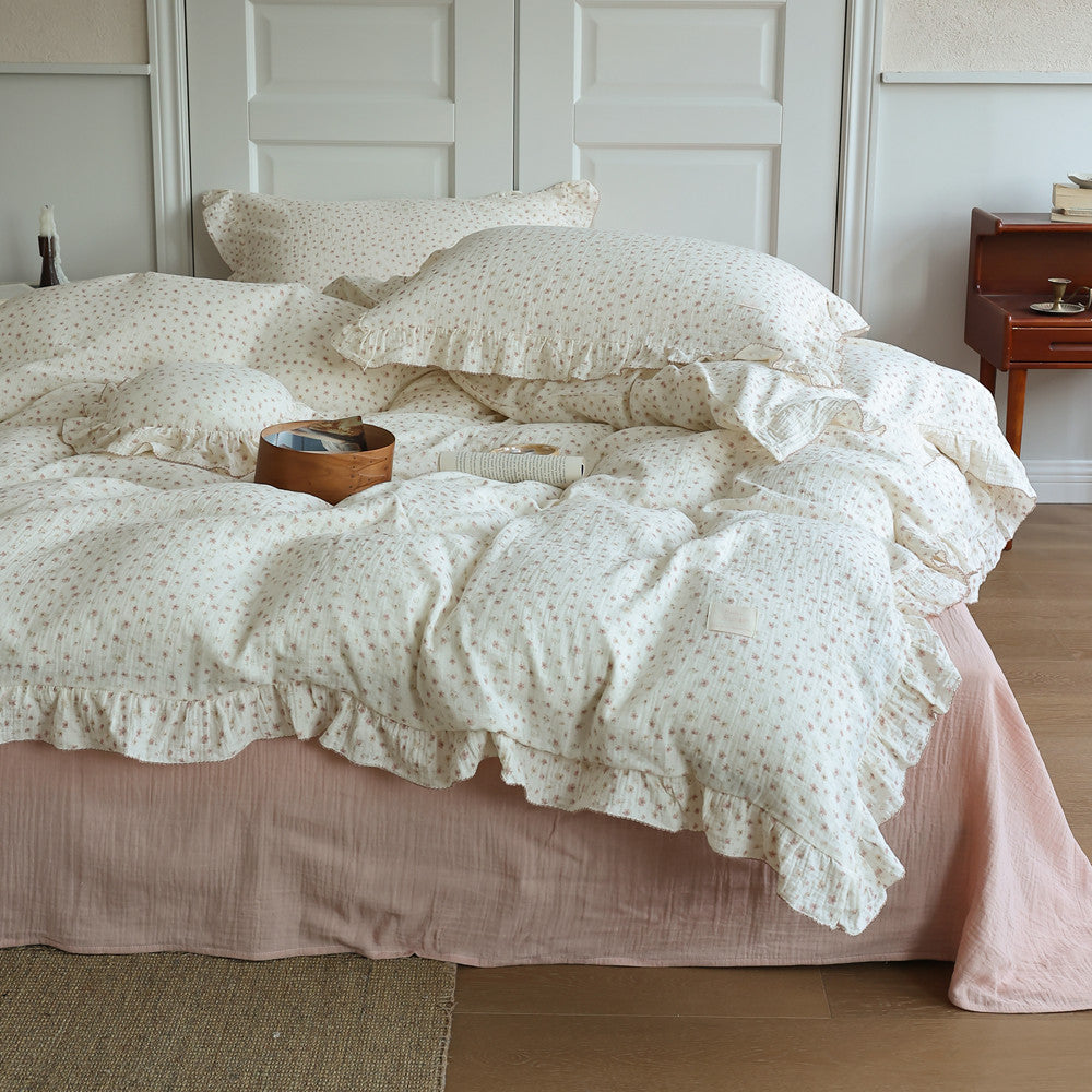 Full bedding set with ruffle duvet cover and pillows in cozy room