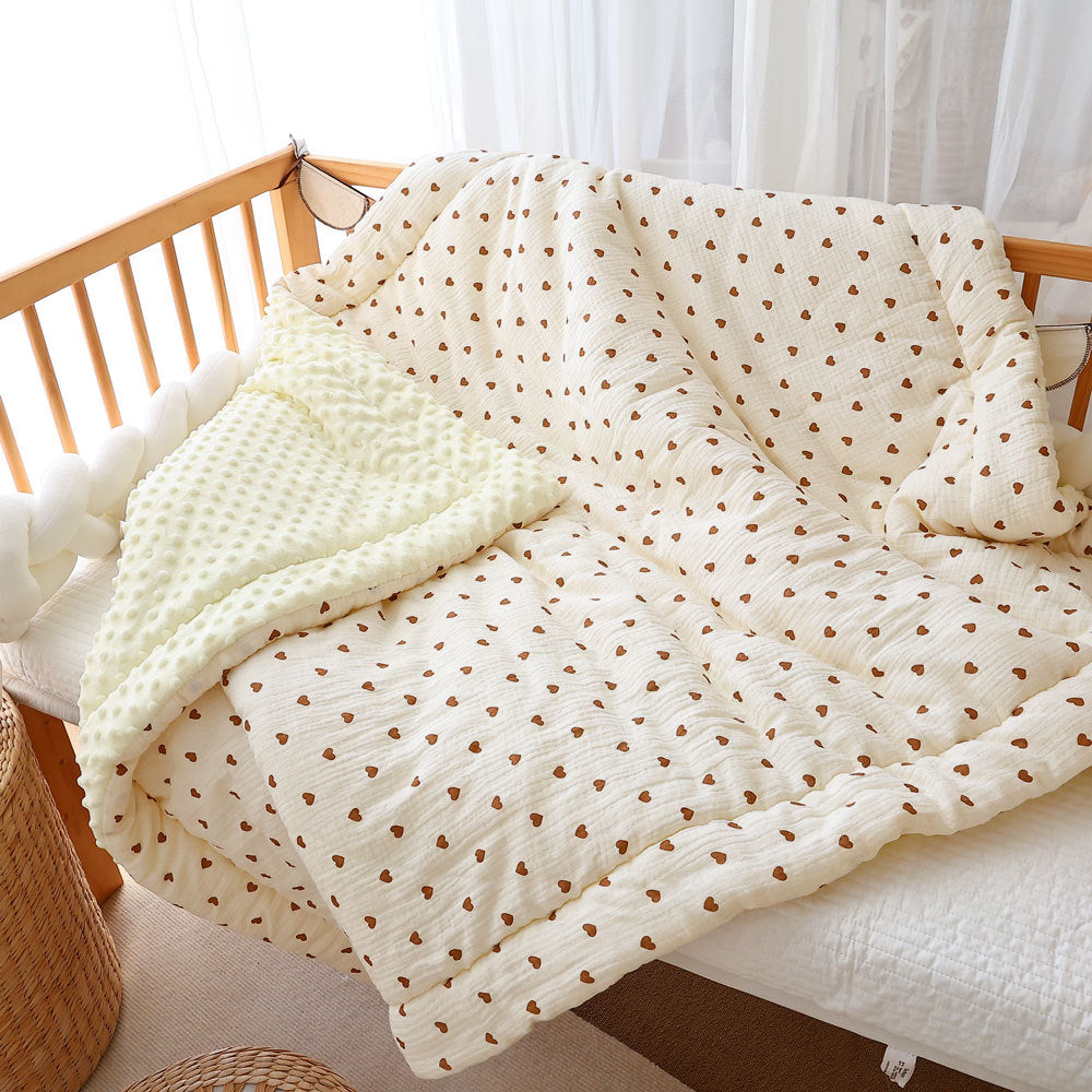 Soft baby quilt ideal for crib and stroller in winter