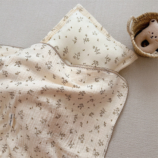 Cozy Olive Green Floral Muslin Toddler Blanket and Quilted Pillow Set, perfect for cribs and nursery decor.