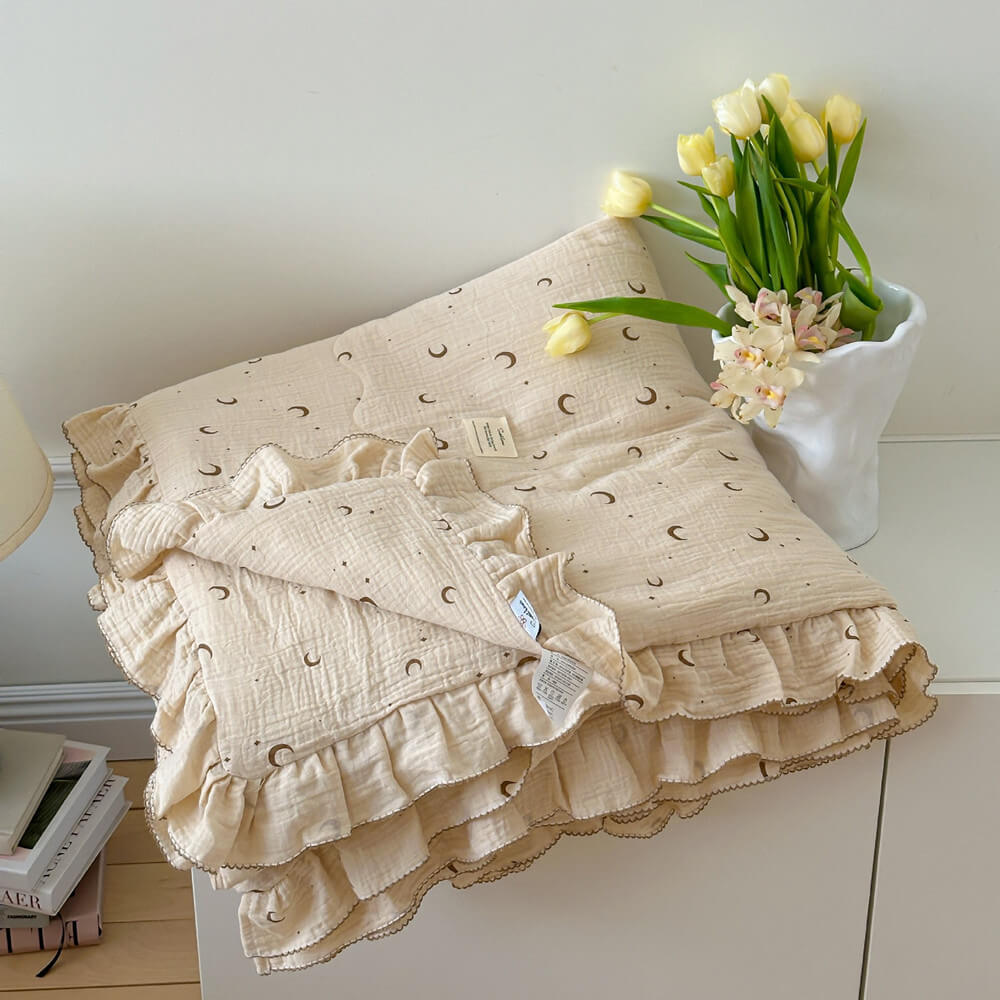 moon and star print cotton muslin quilt, crinkled texture, lightweight bedding