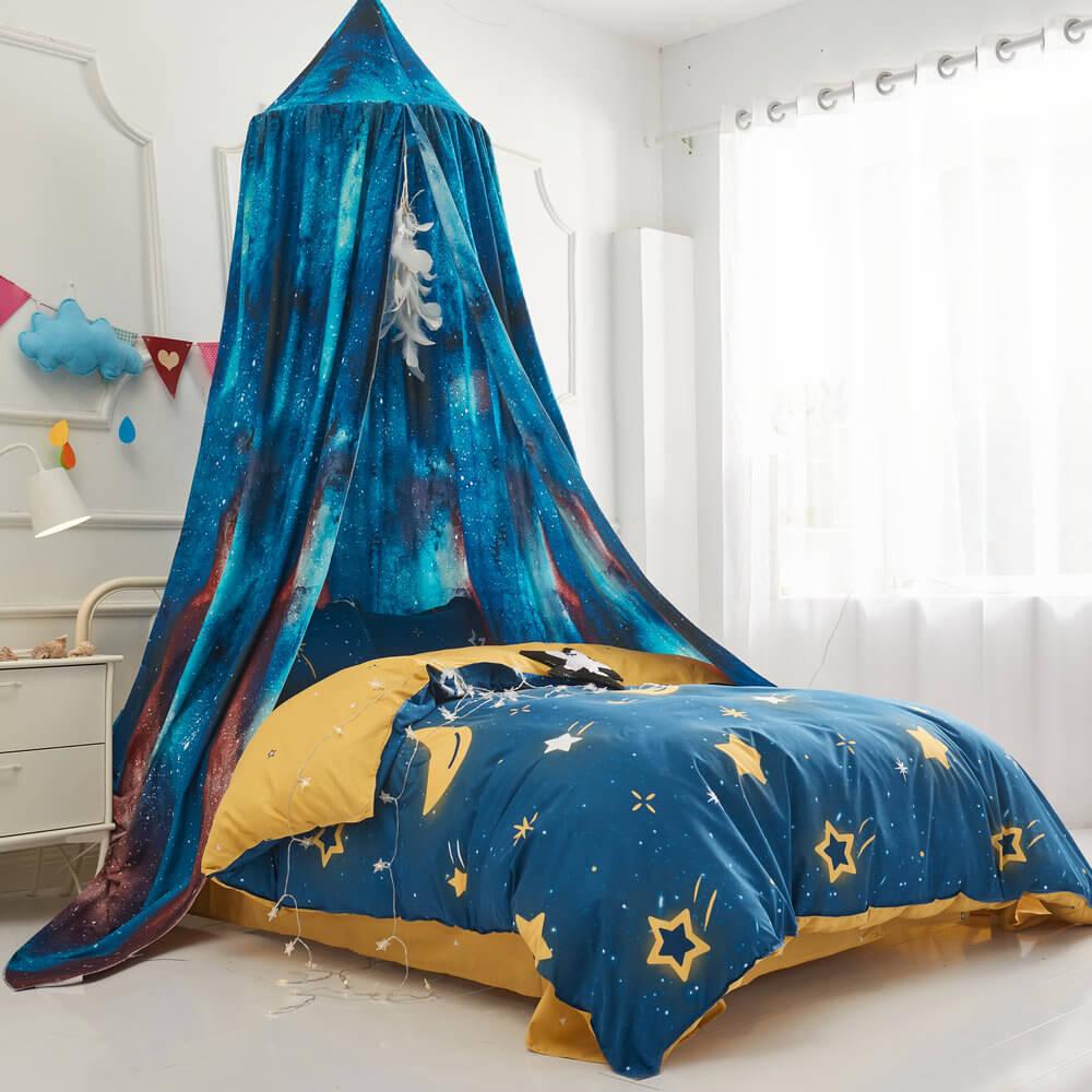 Blackout bed tent canopy in a vivid blue and red universe print, designed for a boy's bedroom.