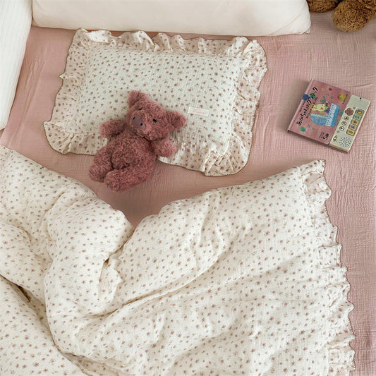 Pink blossom ruffled cotton gauze duvet cover set styled for girls bedroom