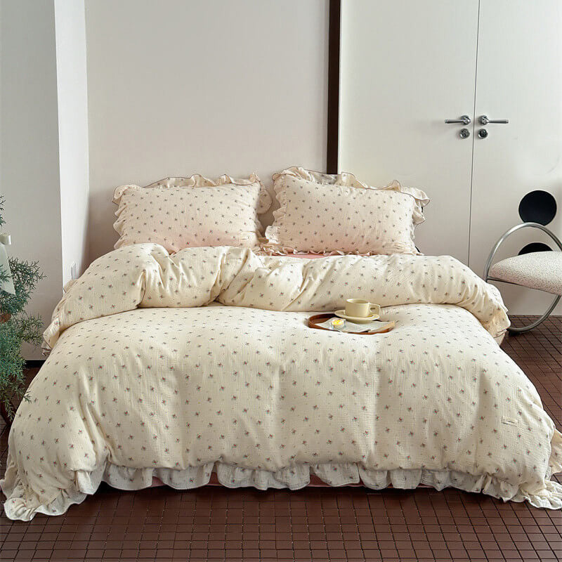 Ruffled edge floral bedding set in cream muslin with petite rose pattern