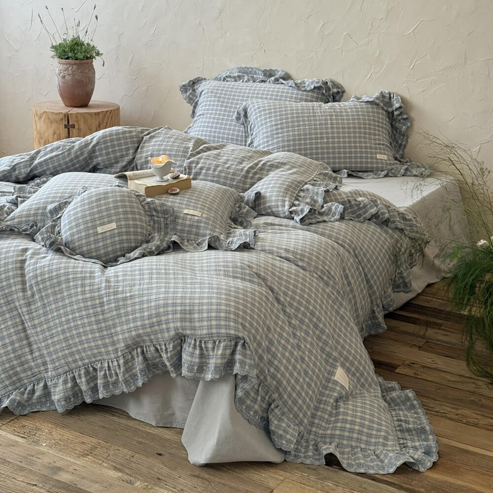 Dusty blue plaid bedding set with ruffle lace trim, cotton muslin, styled on a cozy bed