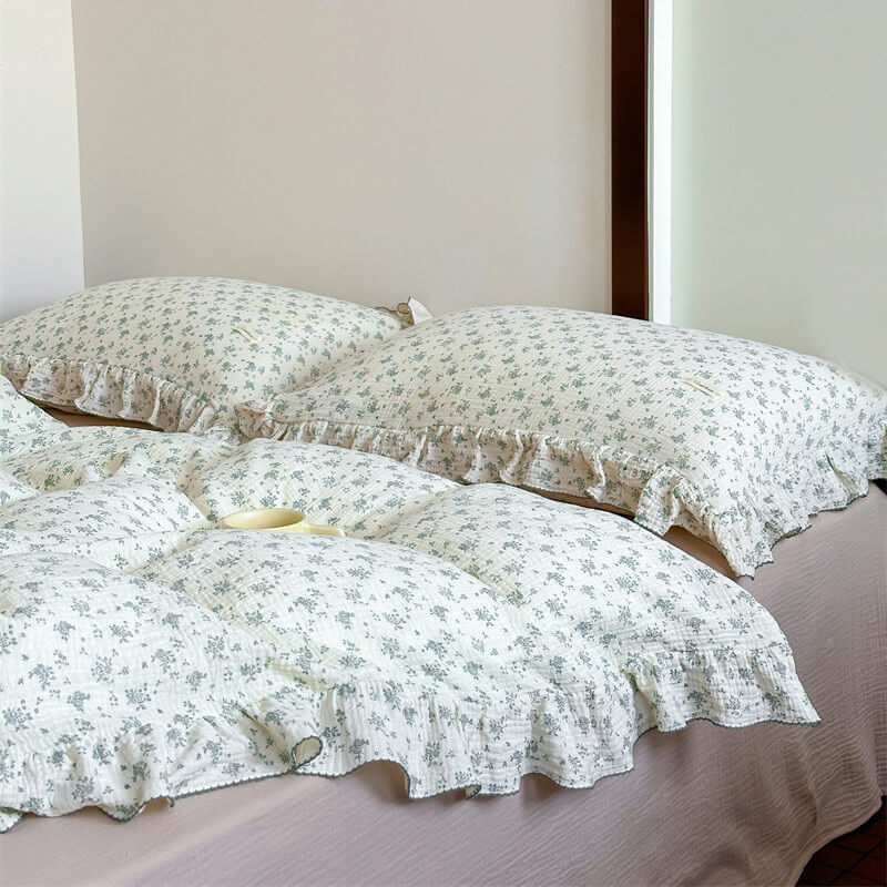 Vintage green floral bedding set with ruffle edges and floral print