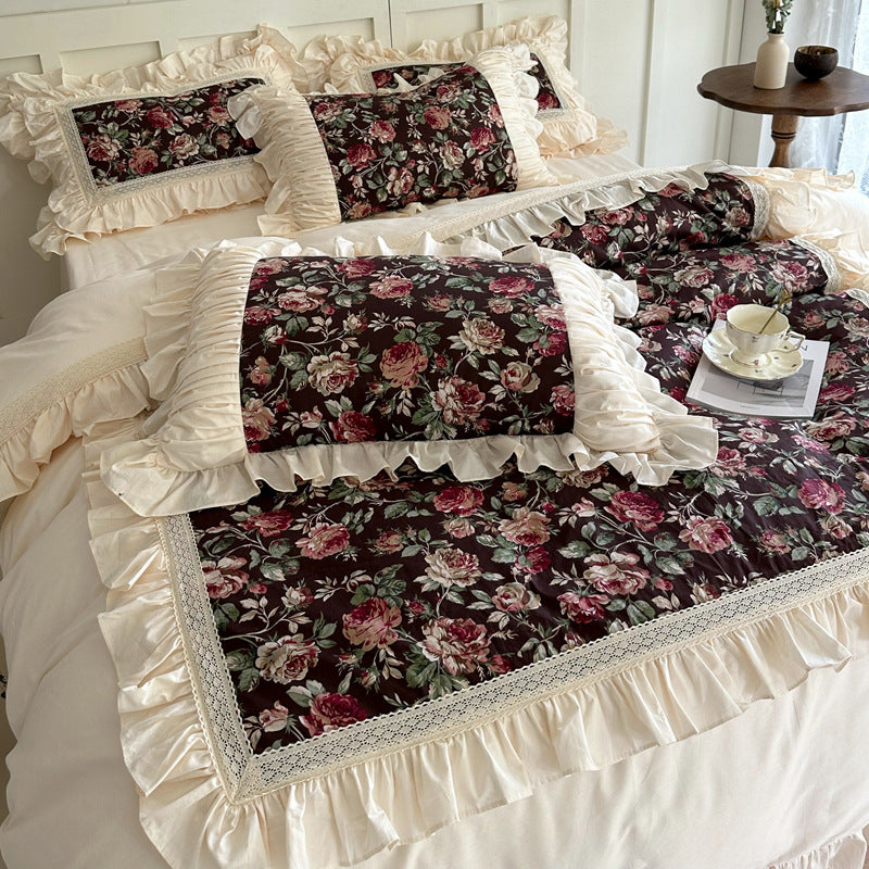 Close-up of soft cotton fabric with dark floral print texture