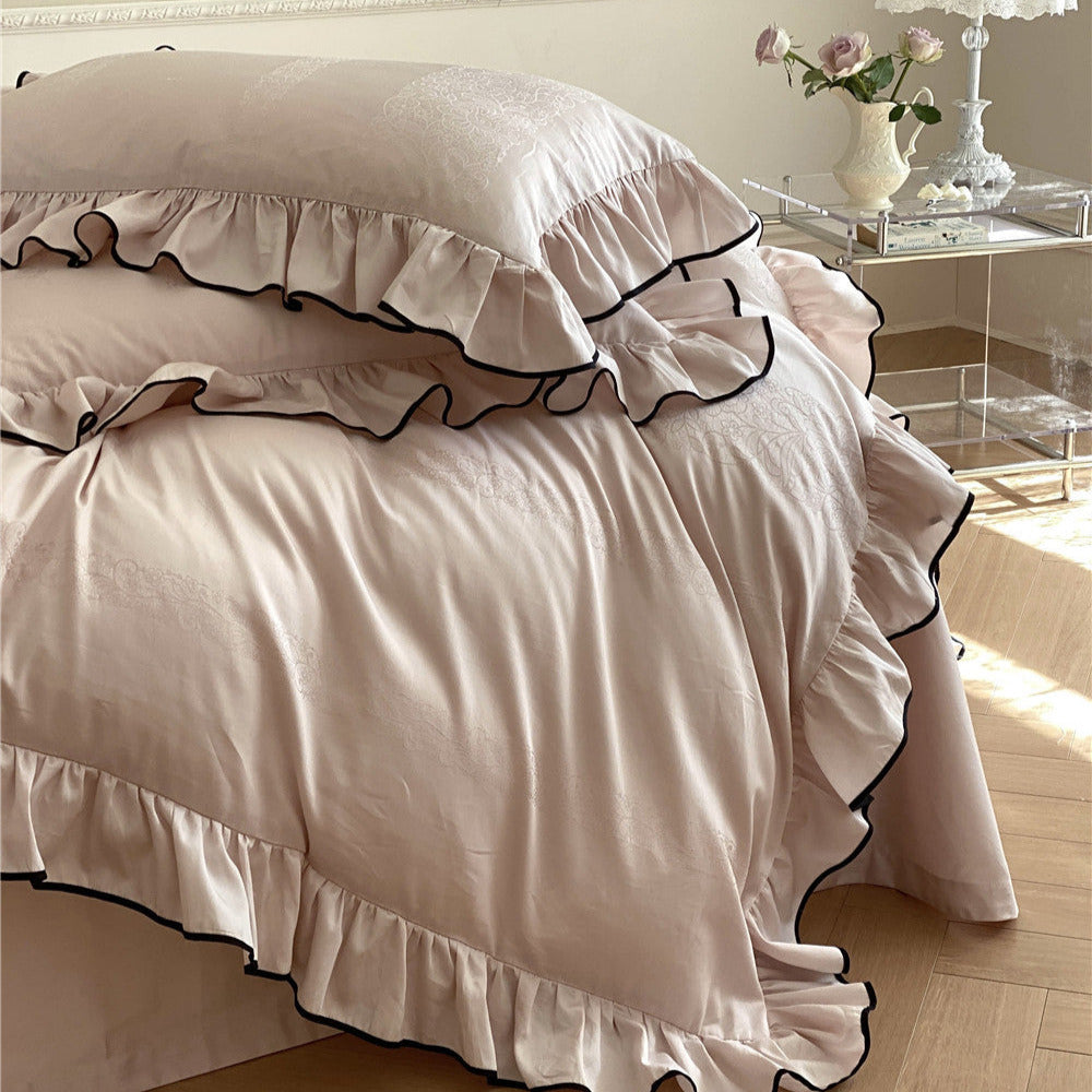 French-style pink cotton sateen bedding with delicate floral texture