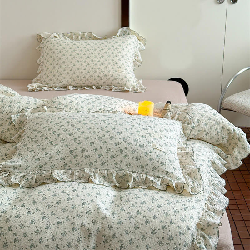 Green floral ruffle bedding set in vintage cotton muslin with duvet cover, pillowcases, and flat sheet