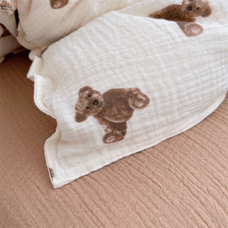 Close-up of teddy bear print on duvet cover and pillowcase