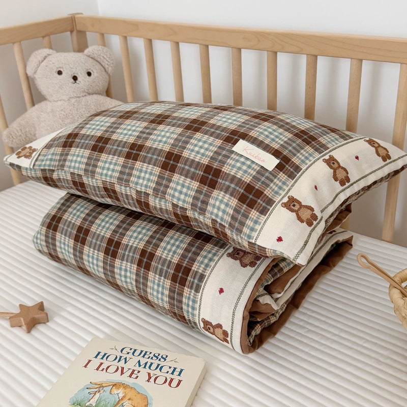 Comforter folded neatly to show softness and thickness of the gauze layers