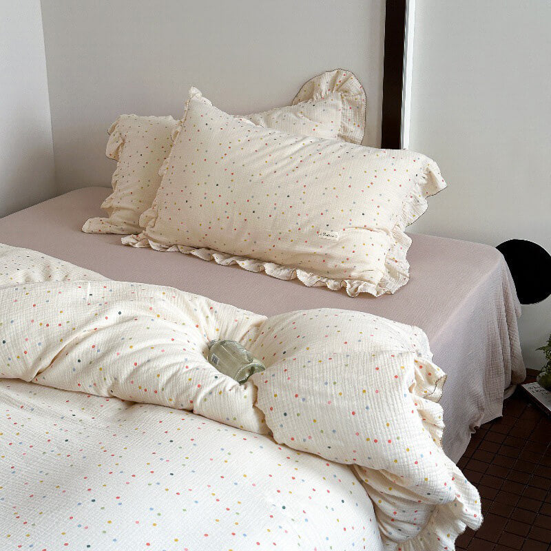 Polka dot ruffle bedding set in cotton muslin with duvet cover, pillowcases, and flat sheet
