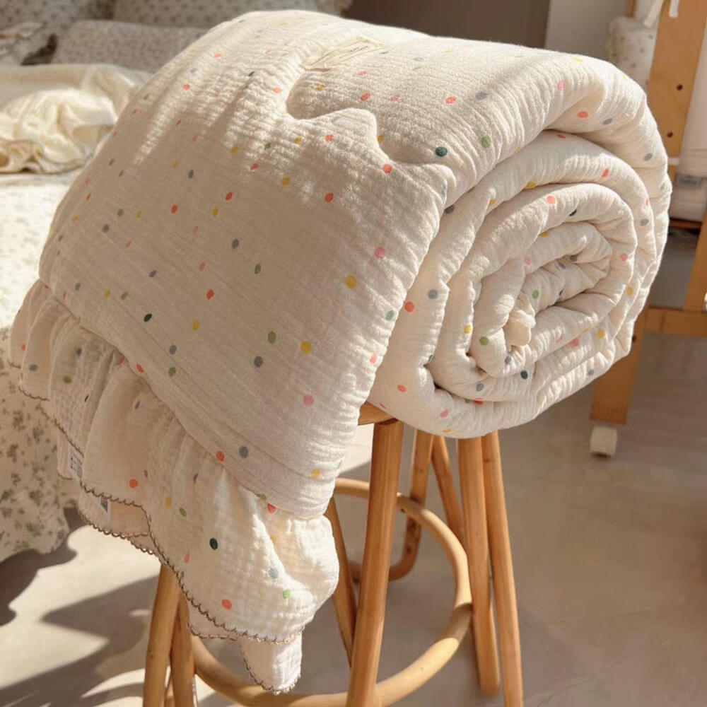 polka dot cotton muslin quilt with ruffle edge