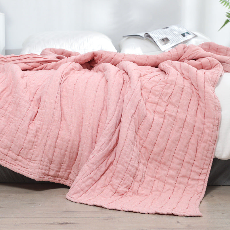cotton muslin throw blanket—available in both queen and twin sizes