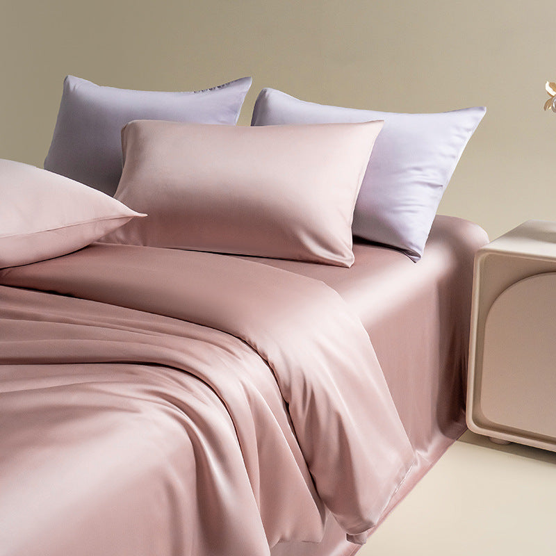 Silky Lyocell bedding set in a soft rose pink, paired with light purple accent pillows, adding a touch of luxury to a child's room.