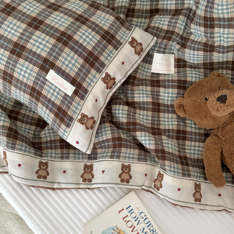 Matching pillowcase with blue plaid pattern and soft finish for kids