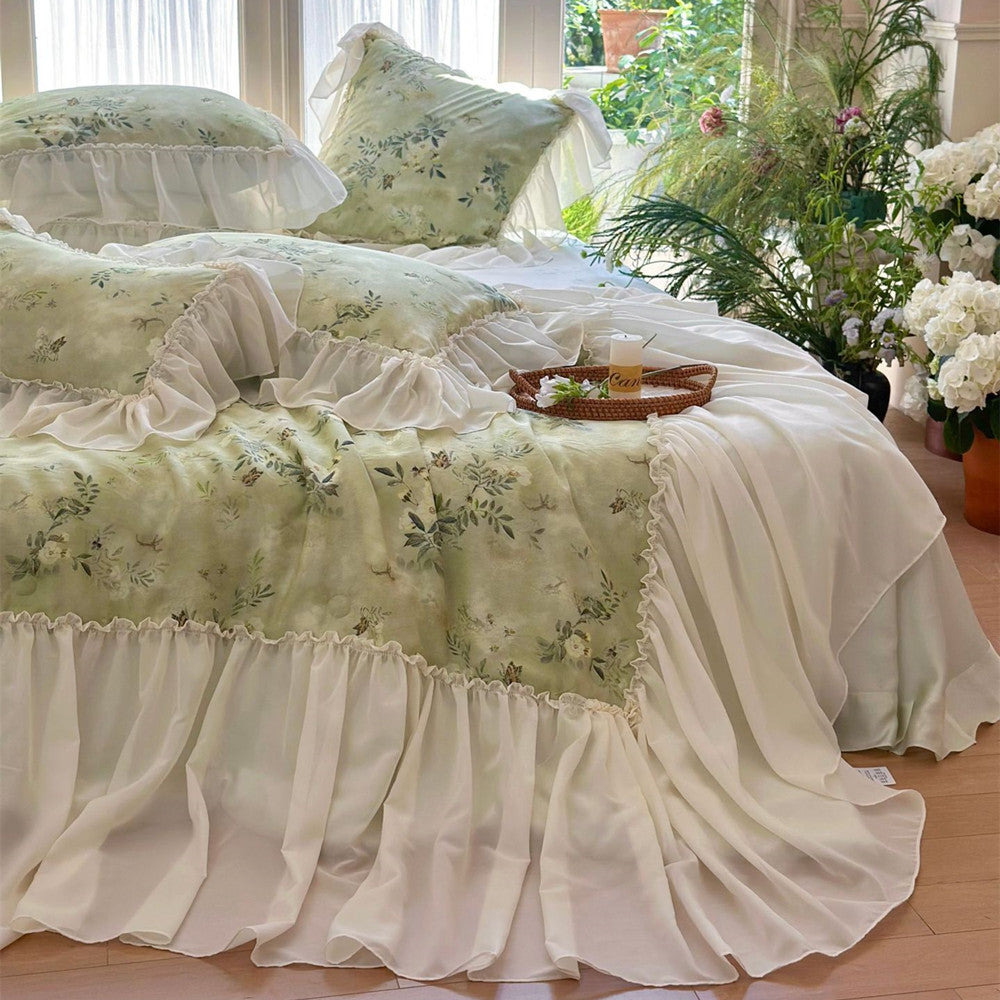 Green ruffled comforter in natural light bedroom
