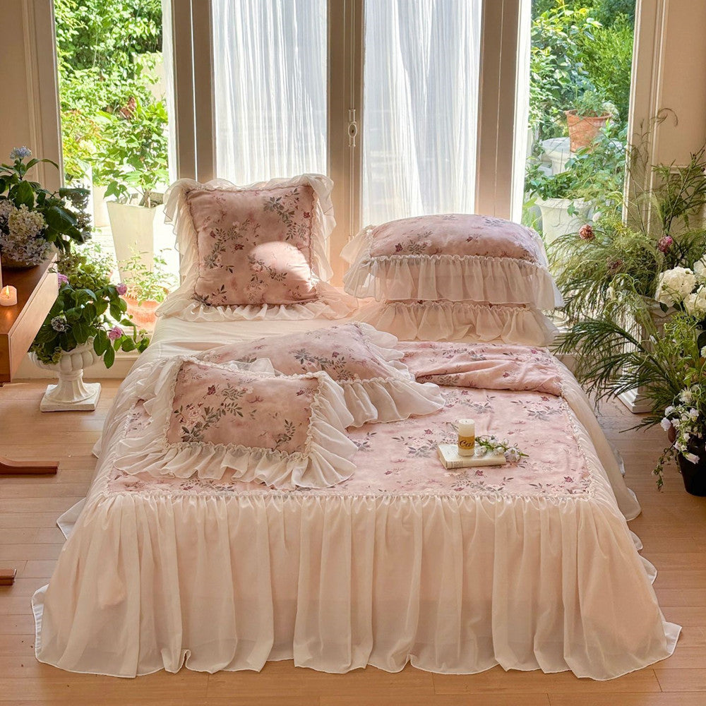 Romantic pink bedding setup with ruffled TENCEL comforter