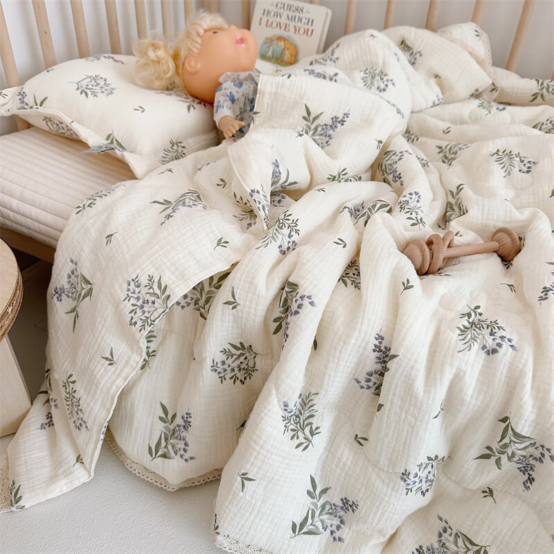 thick muslin baby quilted blanket on the crib