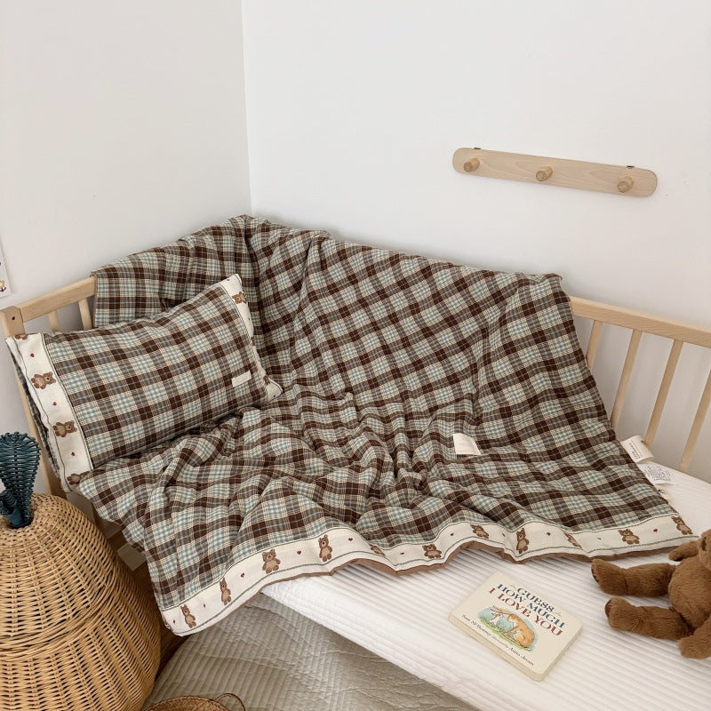 Side view of kids comforter showing gentle fill and smooth finish