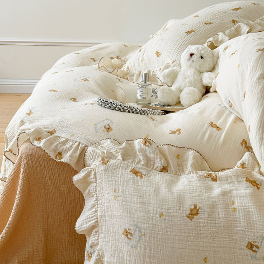 Close-up of teddy bear bubble bath print on cotton muslin fabric