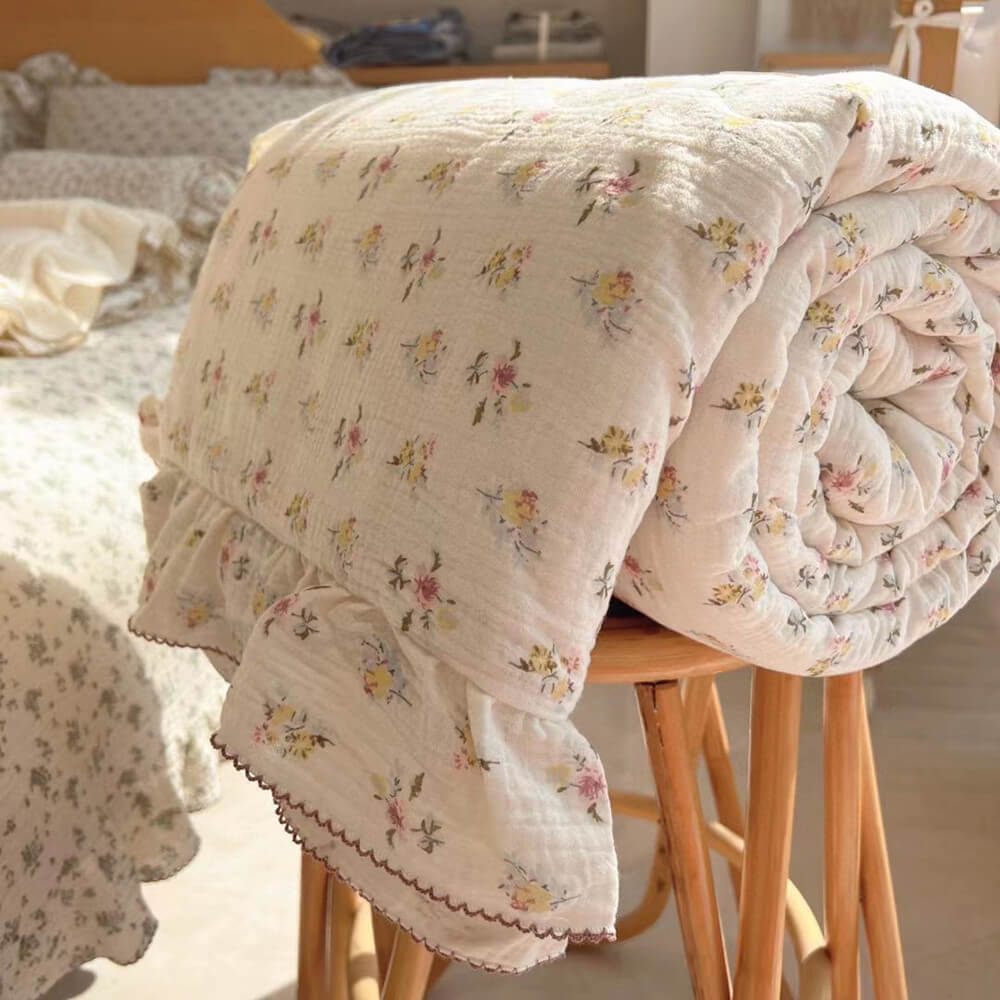 delicate vintage floral print muslin quilt