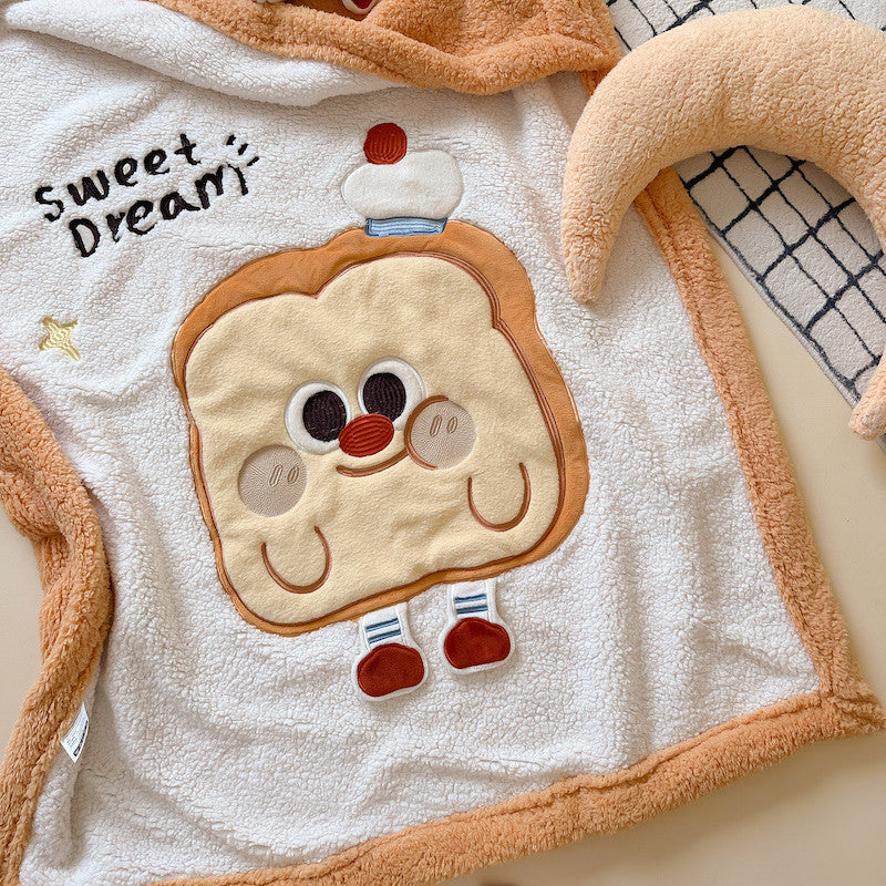 A close-up view of the warm sherpa baby blanket, showcasing the embroidered toast design and "Sweet Dream" text.