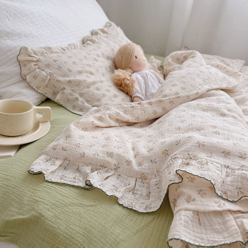 3-piece vintage ruffle duvet cover set with soft floral cotton muslin on bed