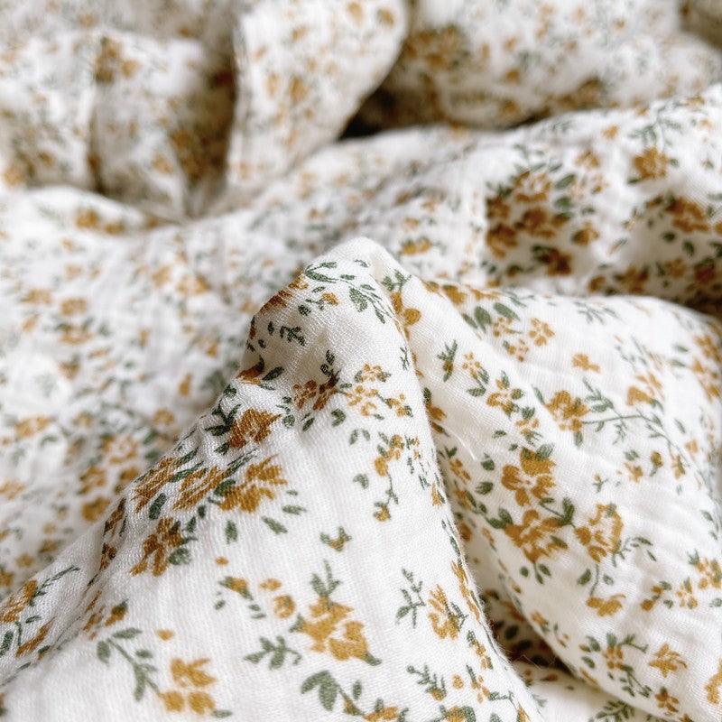 Close-up of breathable muslin fabric baby comforter