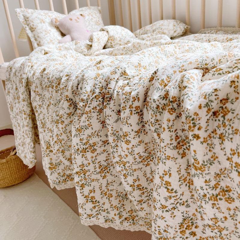 Mustard floral cotton baby comforter with lace trim