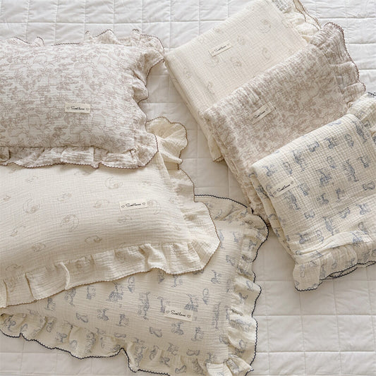 Assorted animal theme ruffle duvet covers in cotton muslin, displayed together for kids’ bedding