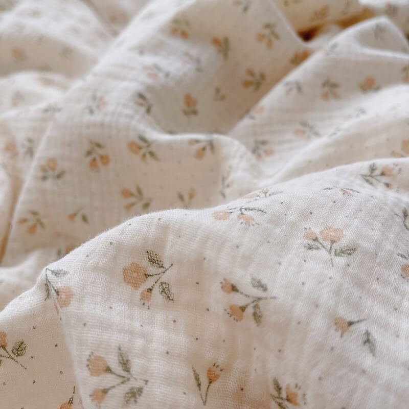 Soft floral cotton muslin fabric detail from vintage ruffle duvet cover set