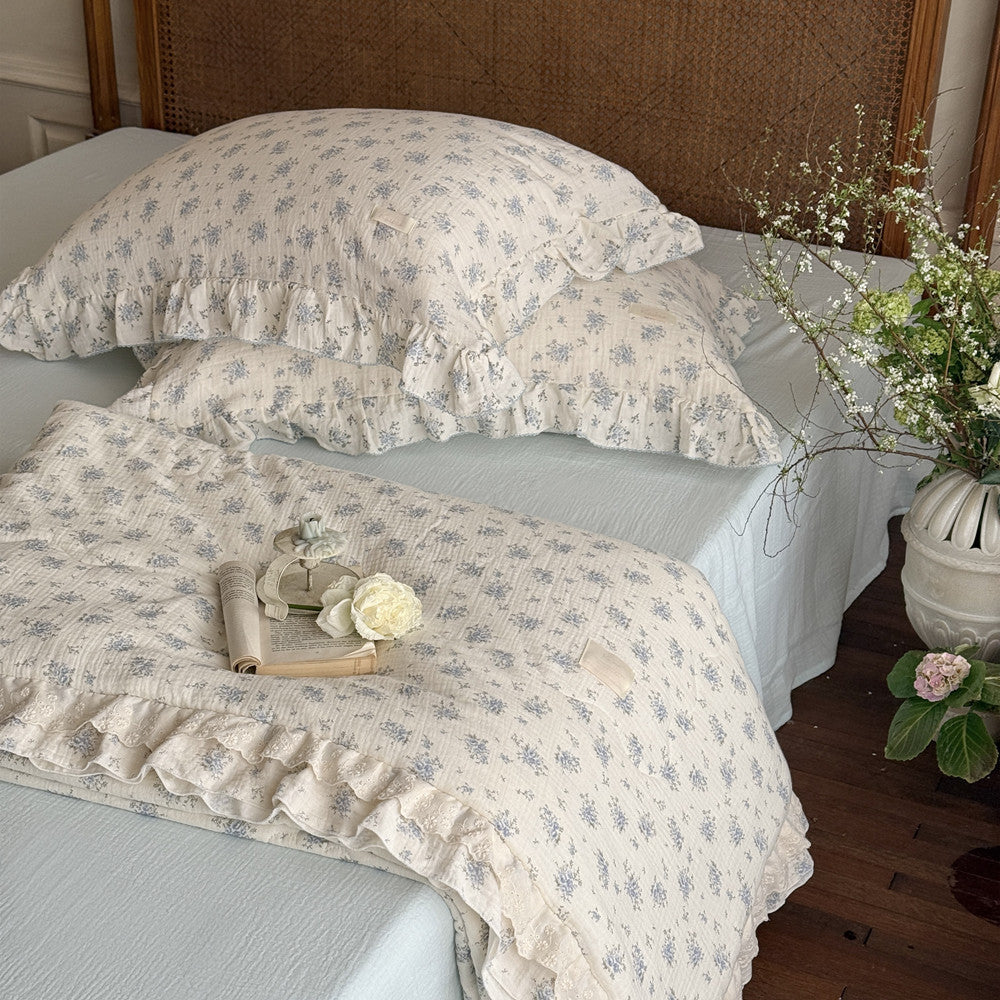Elegant cotton comforter with blue floral print and romantic lace