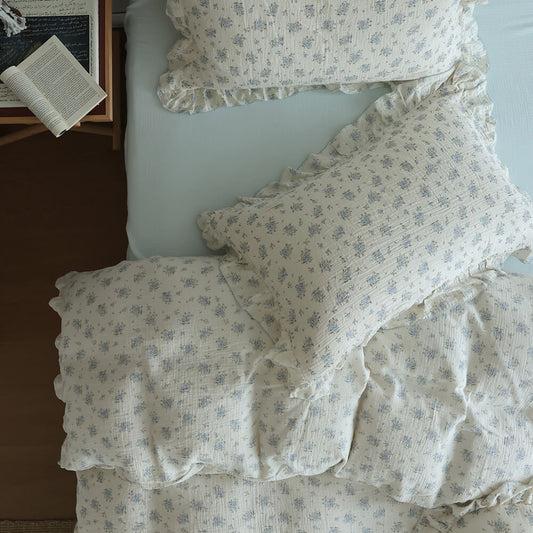 Blue Posy Duvet Cover Set in ruffled cotton muslin with ivory base and soft blue floral print