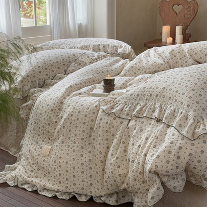 A cozy bedroom scene with two beds featuring the cotton muslin bedding set, showcasing a relaxed and elegant style.