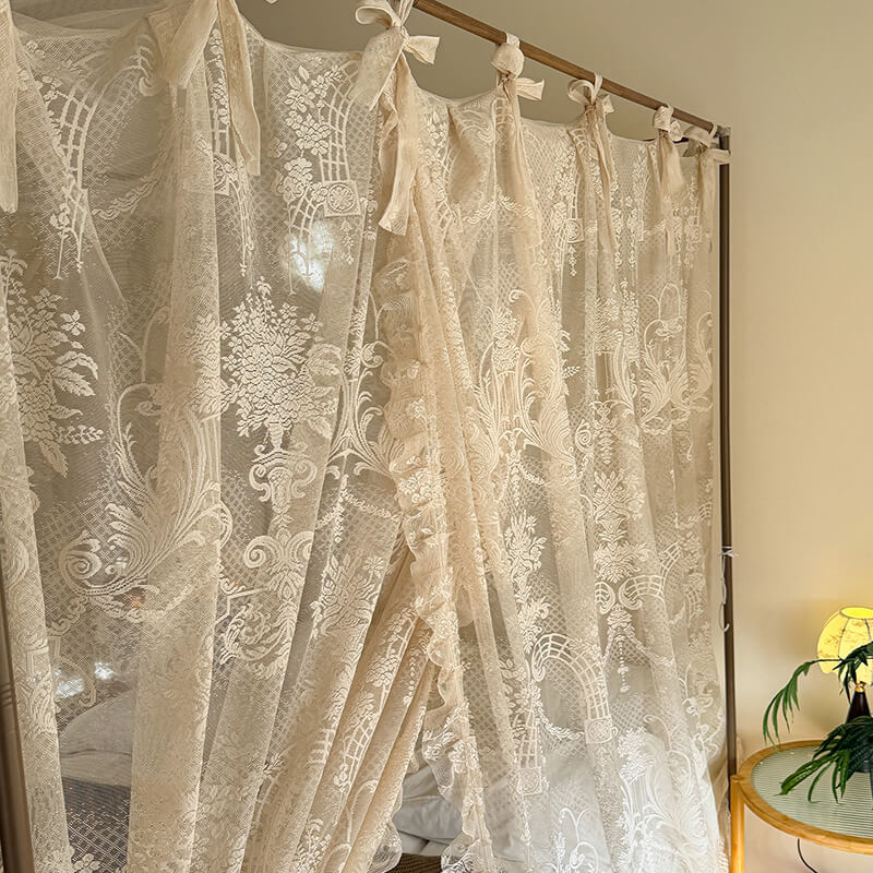 Lace curtain with intricate patterns in a room setting