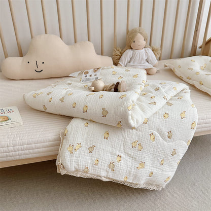 nursery bedding styled with duck comforter