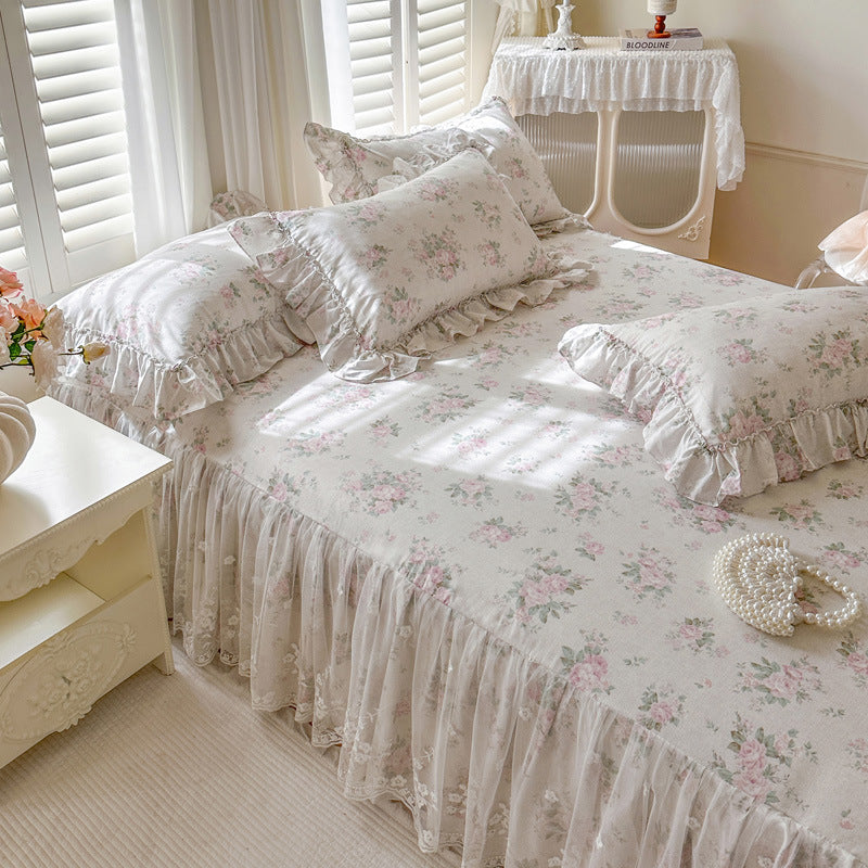 Floral bedding set on a bed in a softly lit bedroom