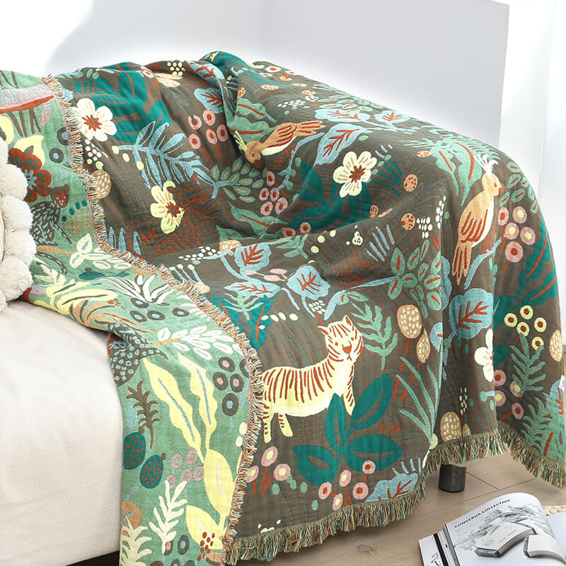 Jungle animal throw blanket with tiger and tropical leaf design